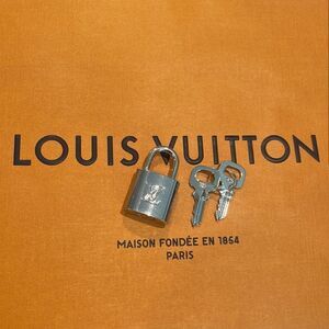 Louis Vuitton Silver Lock and Key